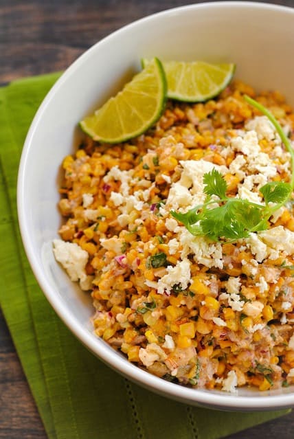 Roasted Mexican Street Corn Salad - A crunchy and spicy salad with just a bit of creaminess. Can be served warm or cold. | foxeslovelemons.com